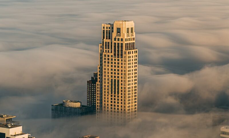 building covered in clouds